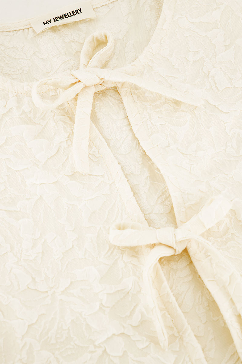 Jacquard-Weste mit Schleifen