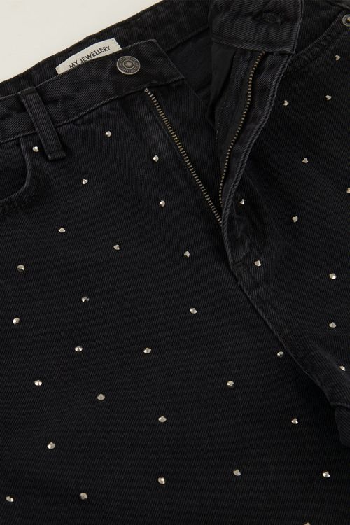 Schwarze Jeans mit weitem Bein und Steinen